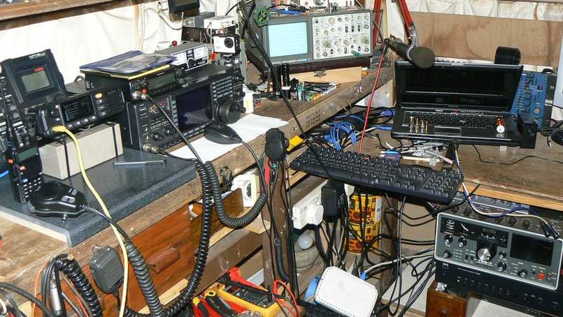 One of my old shack setups from a few years ago when I used an old caravan as my electronics workshop and radio shack.
