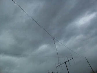 G7FEK nested Marconi L antenna for low HF bands.